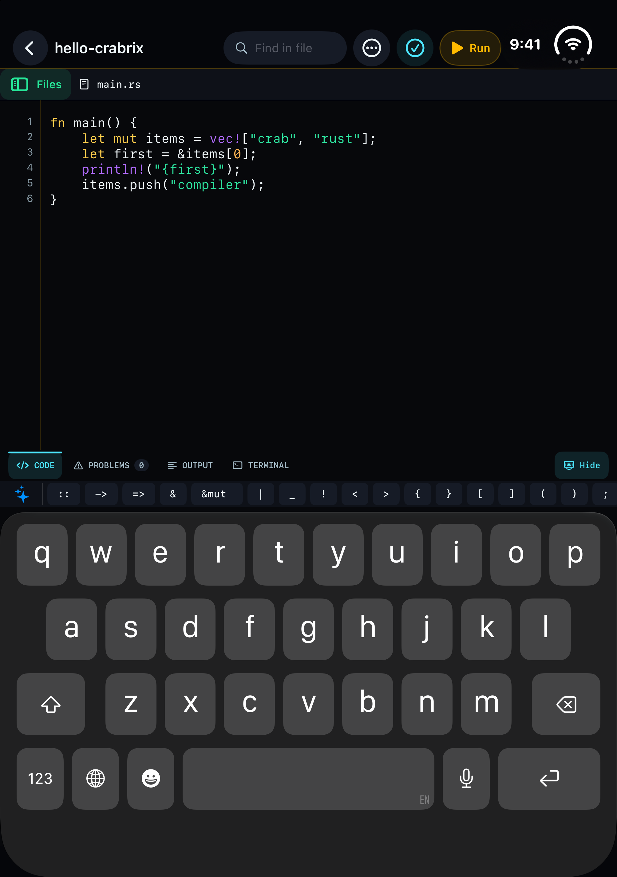 Crabrix on iPhone Duo in laptop posture with project search, Rust editor, code tabs and keyboard